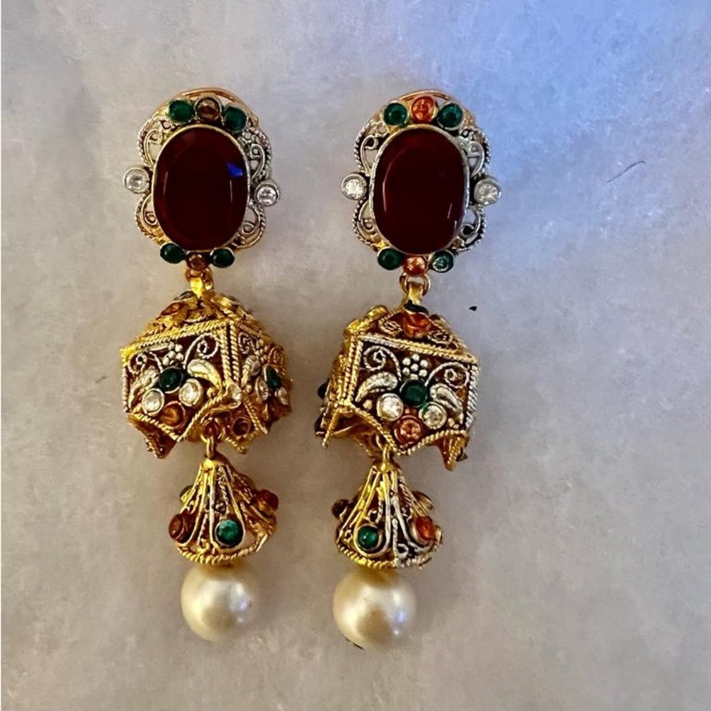 Golden earrings with multi color stones